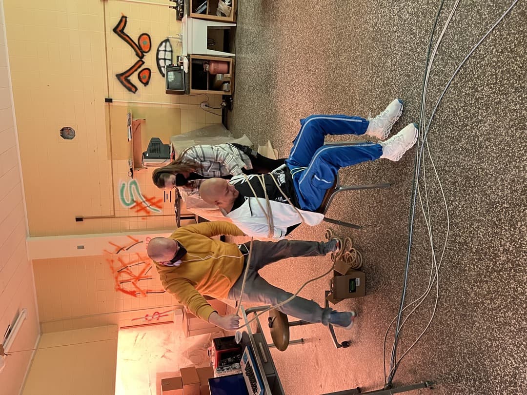 Behind the scenes photo 32 from Clone Cops production showing danny dones and schyler tillett preparing for a scene